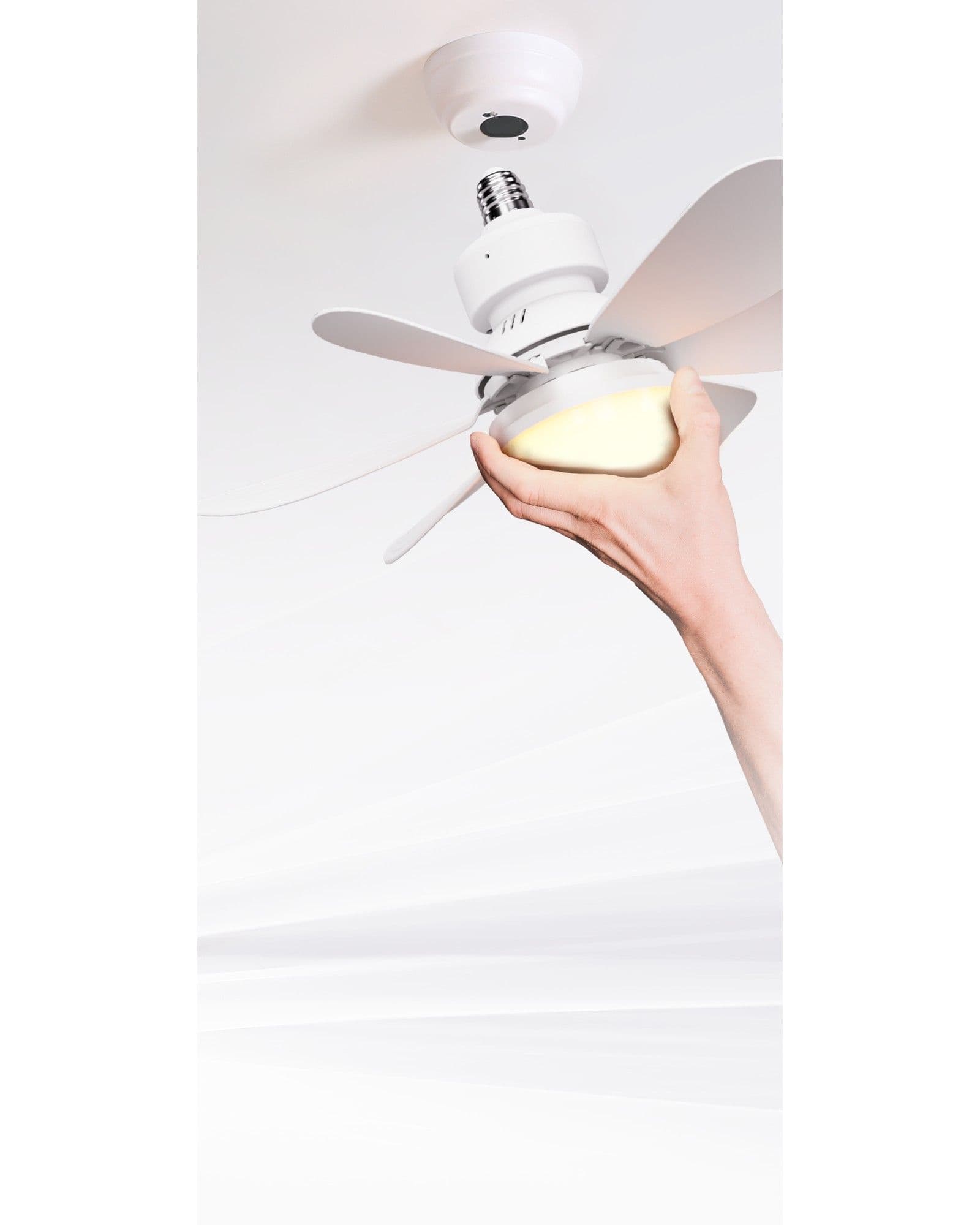 A hand installing an Airbro FLA-21 white ceiling fan light into a socket on a white ceiling.